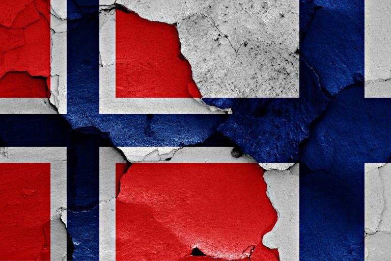 flags of Norway and Finland painted on cracked wall