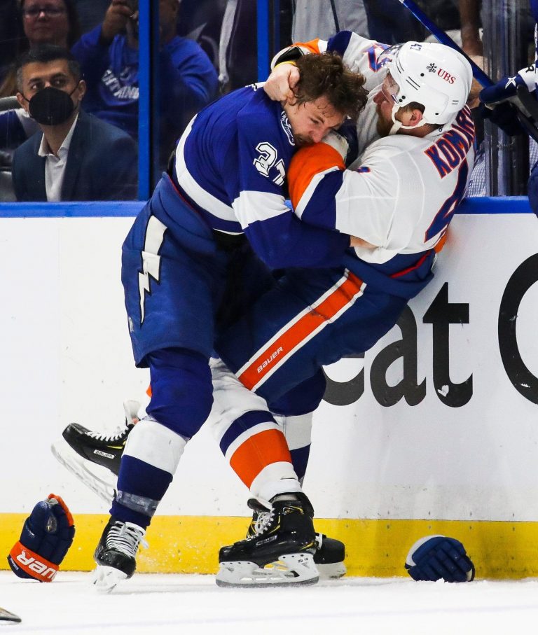 Tampa, Florida, USA. 15th June, 2021. Tampa Bay Lightning center Yanni Gourde (37) drops the gloves and fights with New York Islanders right wing Leo Komarov (47) during the third period in Game 2 of the Stanley Cup semifinals at Amalie Arena on Tuesday,