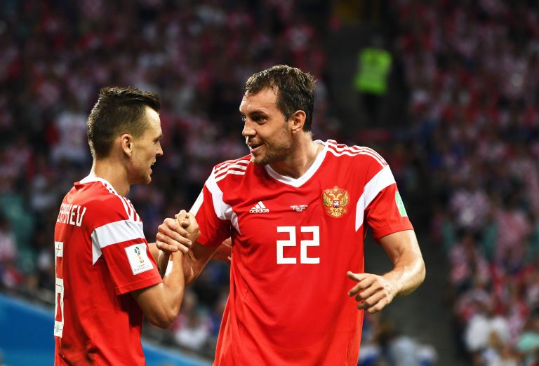 Artem Dzyuba, right, and Denis Cheryshev of Russia react in the quarterfinal match against Croatia during the 2018 FIFA World Cup in Sochi, Russia, 7