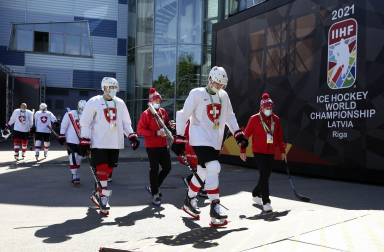 Riga, Latvia. 31st May, 2021. Players of the Swiss national team leave an arena as they go to the Daugava Arena for a training session during the 2021 IIHF World Championship Group Stage. Ice hockey players go to training sessions in full kit due to a ban Riga, Latvia. 31st May, 2021. Players of the Swiss national team leave an arena as they go to the Daugava Arena for a training session during the 2021 IIHF World Championship Group Stage. Ice hockey players go to training sessions in full kit due to a ban