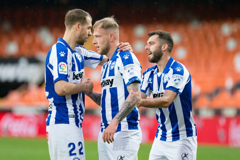 Valencia, Spain. 24th Apr, 2021. John Guidetti and Florian Lejeune of Deportivo Alaves are seen during the Spanish La Liga football match between Valencia and Deportivo Alaves at Mestalla stadium.(Final score; Valencia CF 1:1 Deportivo Alaves) (Photo by X