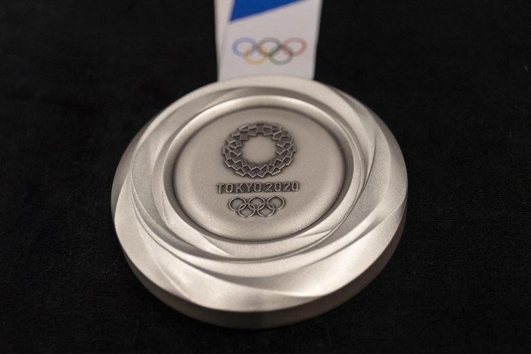 Tokyo, Japan. 24th July, 2019. The design for the Tokyo 2020 Olympic silver medal on display during the ''One Year to Go'' ceremony. Organizers unveiled the designs for the Tokyo 2020 medals during the ''One Year to Go'' ceremony to mark one year to go fo