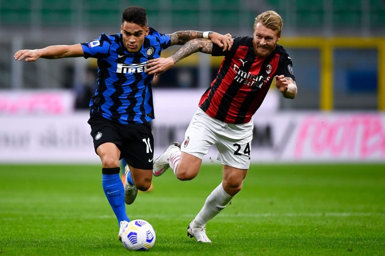 Milan, Italy. 17th Oct, 2020. MILAN, ITALY - October 17, 2020: Lautaro Martinez (L) of FC Internazionale is challenged by Simon Kjaer of AC Milan during the Serie A football match between FC Internazionale and AC Milan. AC Milan won 2-1 over FC Internazio
