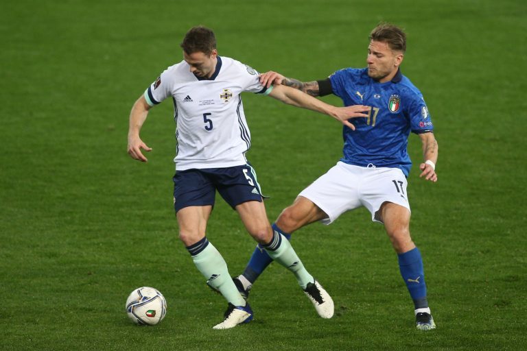 Parma, Italy. 25th Mar, 2021. Parma, Italy 25.03.2021: Jonny Evans C.Immobile (ITALY) in action during the match qualifiers Fifa World Cup Qatar 2022 Group C between Italy vs Northern Ireland in Ennio Tardini stadium in Parma. Credit: Independent Photo Ag Parma, Italy. 25th Mar, 2021. Parma, Italy 25.03.2021: Jonny Evans C.Immobile (ITALY) in action during the match qualifiers Fifa World Cup Qatar 2022 Group C between Italy vs Northern Ireland in Ennio Tardini stadium in Parma. Credit: Independent Photo Ag