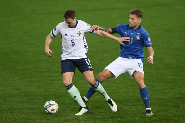 Parma, Italy. 25th Mar, 2021. Parma, Italy 25.03.2021: Jonny Evans C.Immobile (ITALY) in action during the match qualifiers Fifa World Cup Qatar 2022 Group C between Italy vs Northern Ireland in Ennio Tardini stadium in Parma. Credit: Independent Photo Ag Nordirland – Italien, 15/11: Speltips & stream