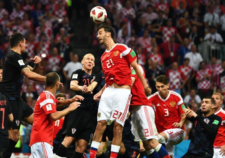 Aleksandr Yerokhin of Russia, center, heads the ball against Croatia in their quarterfinal match during the 2018 FIFA World Cup in Sochi, Russia, 7 Ju Aleksandr Yerokhin of Russia, center, heads the ball against Croatia in their quarterfinal match during the 2018 FIFA World Cup in Sochi, Russia, 7 Ju
