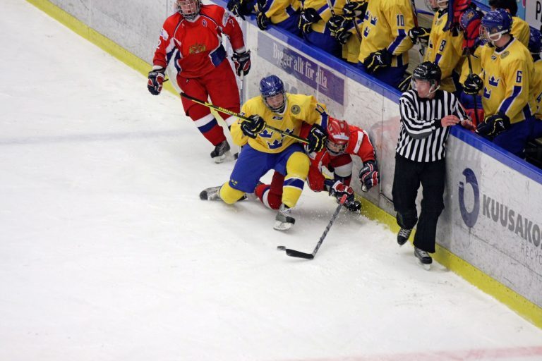 No 17 in Sweden, Carl Klingberg, giving a Russian player a hard hit against the boards.. Image shot 02/2009. Exact date unknown. No 17 in Sweden, Carl Klingberg, giving a Russian player a hard hit against the boards.. Image shot 02/2009. Exact date unknown.