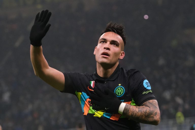 InterOs Argentinian forward Lautaro Martinez celebrates after scoring a goal during the Serie A football match between SSC Napoli and Inter at the Giuseppe Meazza Stadium Milan, North Italy, on November 21, 2021.