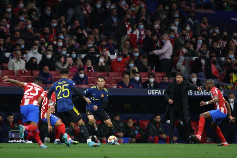 Madrid, Spain, 23rd February 2022. Diego Simeone Head coach of Atletico Madrid reacts as Cristiano Ronaldo of Manchester United plays the ball during the UEFA Champions League match at Estadio Metropolitano, Madrid. Picture credit should read: Jonathan Mo Madrid, Spain, 23rd February 2022. Diego Simeone Head coach of Atletico Madrid reacts as Cristiano Ronaldo of Manchester United plays the ball during the UEFA Champions League match at Estadio Metropolitano, Madrid. Picture credit should read: Jonathan Mo