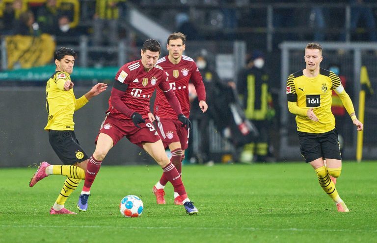 Dortmund, Germany. 04th Dec, 2021. Robert LEWANDOWSKI, FCB 9 Leon GORETZKA, FCB 8 compete for the ball, tackling, duel, header, zweikampf, action, fight against Mahmoud DAHOUD, BVB 8 Marco REUS, BVB 11 in the matchBORUSSIA DORTMUND - FC BAYERN MUNCHEN Dortmund, Germany. 04th Dec, 2021. Robert LEWANDOWSKI, FCB 9 Leon GORETZKA, FCB 8 compete for the ball, tackling, duel, header, zweikampf, action, fight against Mahmoud DAHOUD, BVB 8 Marco REUS, BVB 11 in the matchBORUSSIA DORTMUND - FC BAYERN MUNCHEN