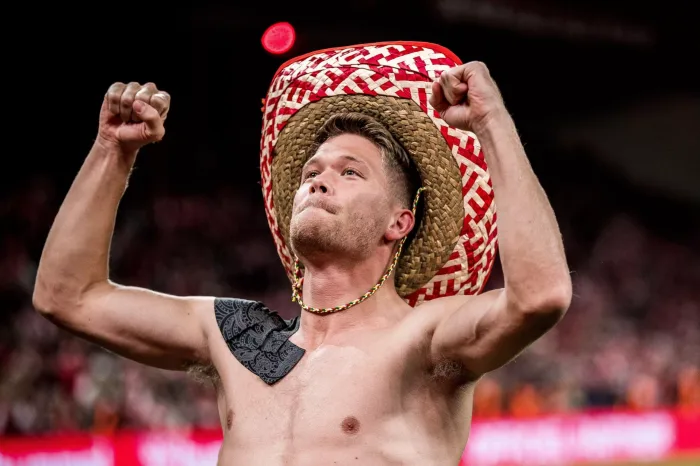 Copenhagen, Denmark. 12th Oct, 2021. Andreas Cornelius of Denmark celebrates with the fans after the UEFA World Cup qualifier between Denmark and Austria at Parken in Copenhagen. (Photo Credit: Gonzales Photo/Alamy Live News