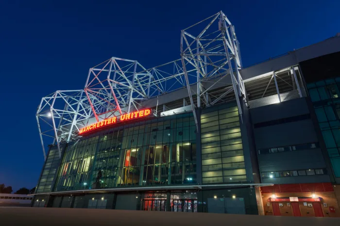 Old Trafford stadium, home of Manchester United Football Club, during a summer's evening (Editorial use only).