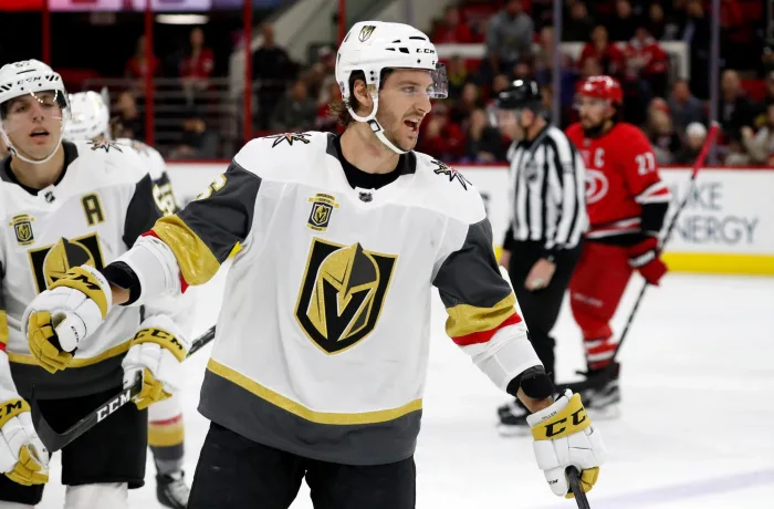 Raleigh, USA. 21st Jan, 2018. Vegas Golden Knights' Colin Miller (6) celebrates his goal as he comes back to the bench during the first period against the Carolina Hurricanes on Sunday, Jan. 21, 2018 at PNC Arena in Raleigh, N.C. Credit: Chris Seward/Rale