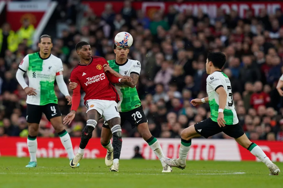 Manchester, UK. 17th Mar, 2024. Marcus Rashford of Manchester United tussles with Jarell Quansah of Liverpool during The FA Cup Quarter Final match at Old Trafford, Manchester. Picture: Andrew Yates/Sportimage Credit: Sportimage Ltd/Alamy Live News marcus rashford mot liverpool